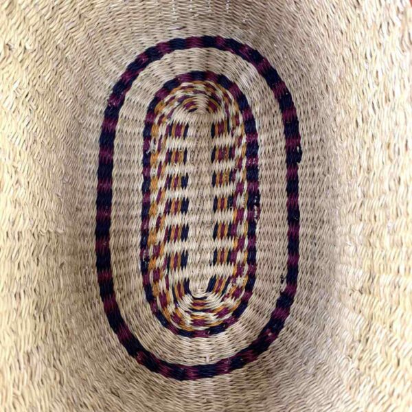 oval-basket-475-bottomless-natural-african-woven-bashiri-4 Inside base of the natural oval Bolga basket, showing the dark coiled ring