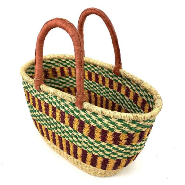 oval-basket-477-loquacious-green-maroon-woven-bolga-bashiri-2 Angled view of the oval Bolga basket with a green checkered band over maroon and gold stripes, showing the woven interior