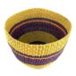 Top view of the bright banded planter basket showing the woven interior
