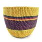 Front view of the warm-toned banded planter basket, handwoven from elephant grass