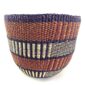 Front view of the earthy ribbed planter basket, handwoven from elephant grass