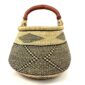 Front view of the Bolga pot basket with a black and natural zigzag and diamond pattern and a leather-wrapped handle on a white background