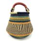Front view of the Bolga pot basket with orange, navy and green bands above a black and natural diagonal pattern and a leather-wrapped handle on a white background