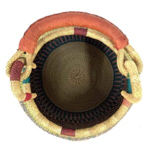 Top view inside the Bolga pot basket with soft teal, peach and green stripes and a leather-wrapped handle