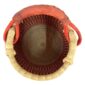 Top view inside the Bolga pot basket with an orange-red and natural stepped pattern and a leather-wrapped handle