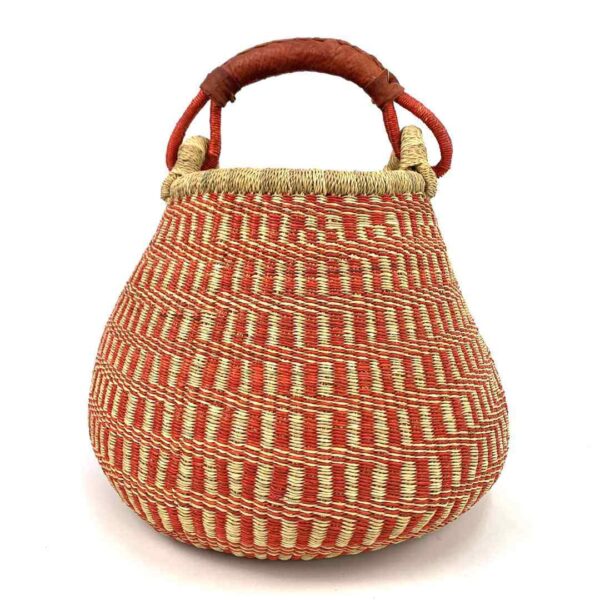 pot-basket-310-snozzberry-red-bolga-woven-bashiri-3 Front view of the Bolga pot basket with an orange-red and natural stepped pattern and a leather-wrapped handle on a white background