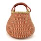 Front view of the Bolga pot basket with an orange-red and natural stepped pattern and a leather-wrapped handle on a white background