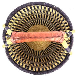 Top-down view of a spacious round Bolga basket bag showing woven pattern and wide opening