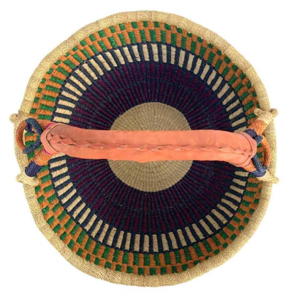 round-basket-xl-564-optimus-orange-navy-bolga-african-basket-bashiri-2 Top-down view inside the orange and navy xl round bolga basket, showing the coiled base