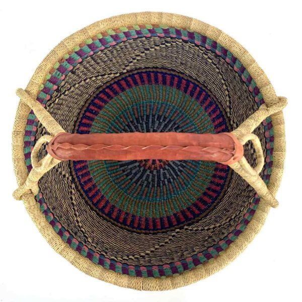 round-basket-xl-565-hefty-purple-teal-woven-bolga-bashiri-2 Top-down view inside the purple and teal xl round bolga basket, showing the coiled base