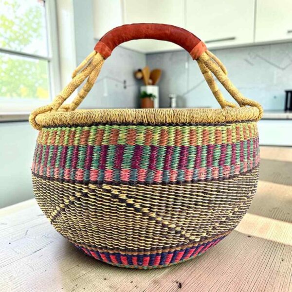 XL round Bolga basket in purple and teal, handwoven from elephant grass