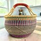 XL round Bolga basket in purple and teal, handwoven from elephant grass