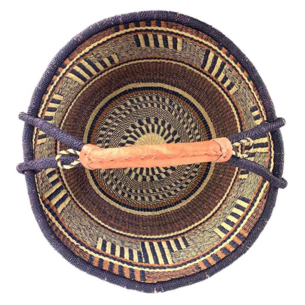 round-basket-xl-567-portly-brown-navy-bolga-woven-bashiri-2 Top-down view inside the brown and navy xxl round bolga basket, showing the coiled base