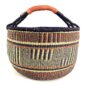 Front view of the brown and navy xxl round bolga basket on a white background
