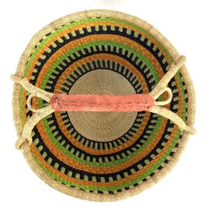 Top-down view inside the lime and orange xxl round bolga basket, showing the coiled base
