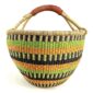 Front view of the lime and orange xxl round bolga basket on a white background
