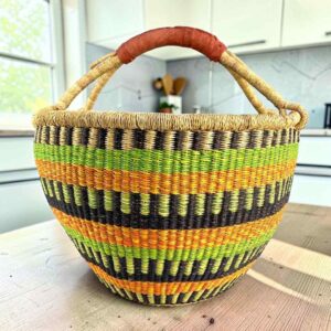 XXL round Bolga basket in lime and orange, handwoven from elephant grass