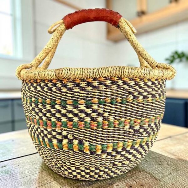 round-large-basket-843-kings-bolga-main Large round Bolga basket in a muted colourway, leather handles