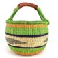 Angled view of the large round Bolga basket, cocoa