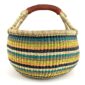 Angled view of the large round Bolga basket, casa