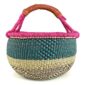 Angled view of the large round Bolga basket, rainforrest