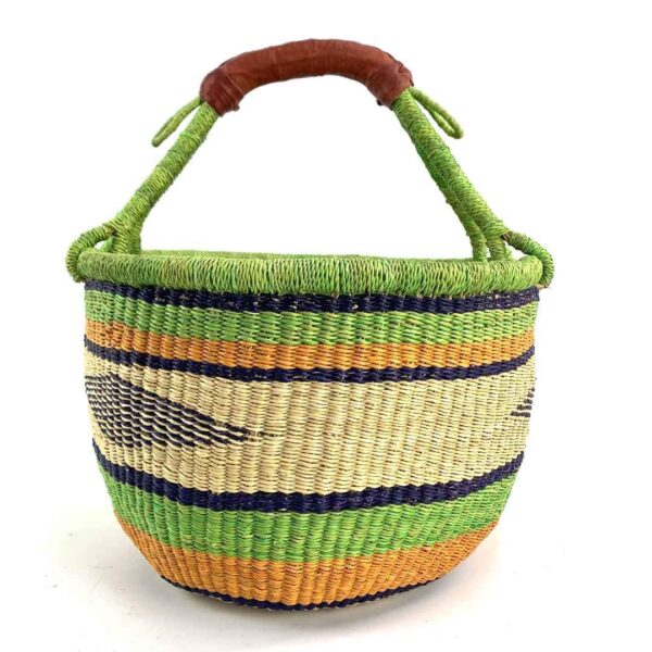 round-large-basket-855-uplift-green-orange-navy-bolga-woven-bashiri-3 Front view of the large round Bolga basket with bright leafy and citrus bands and deep inky stripes, on a white background