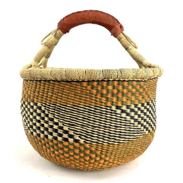 round-large-basket-857-bliss-orange-black-woven-bolga-bashiri-3 Front view of the large round Bolga basket with warm amber tones and a dark diagonal checkerboard, on a white background