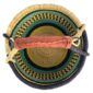 Top-down view inside the large round Bolga basket with bold sunny, sea-green and deep inky bands, showing the coiled base and leather handle