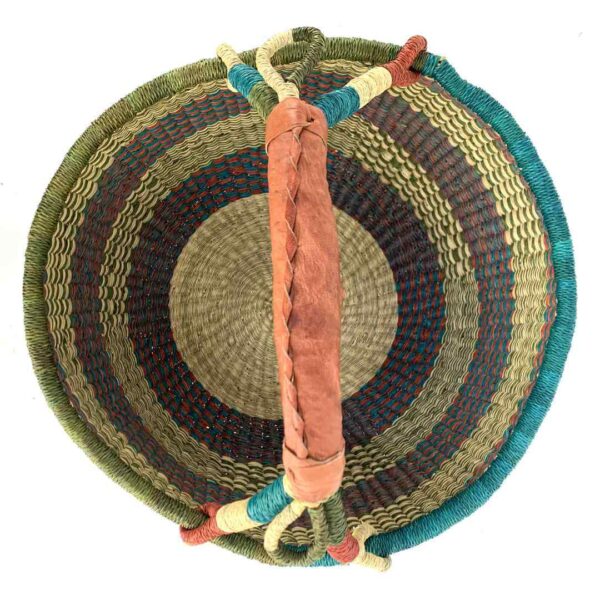 round-large-basket-862-sparkle-olive-grey-bolga-african-bashiri-2 Top-down view inside the large round Bolga basket with muted olive and slate tones with natural checks, showing the coiled base and leather handle