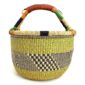 Front view of the large round Bolga basket with zesty citrus tones and a diagonal inky checked section, on a white background