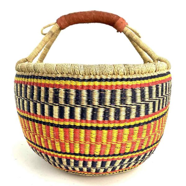 round-large-basket-867-joyful-orange-yellow-black-bolga-woven-bashiri-3 Front view of the large round Bolga basket with sunny and fiery bands with dark zigzag rows, on a white background