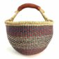 Front view of the large round Bolga basket with a sea-green and berry band over fine inky patterning, on a white background
