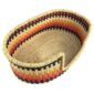 Angled view of the small red and orange pet basket showing the woven elephant grass base