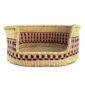 Front view of the small natural Bolga pet basket with pink and black checks and a dipped front