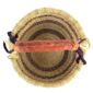 Top view of the small round Bolga basket showing the coiled base and leather-wrapped handle