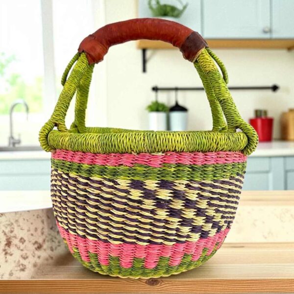 small-round-african-basket-704-kojo-bashiri Small round Bolga basket with a chequered body and bright handle wraps and leather-wrapped handle