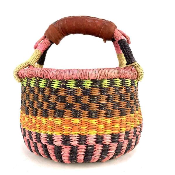 small-round-african-basket-711-ama-bashiri-2 Front view of the small round Bolga basket with bold chequered bands in warm tones