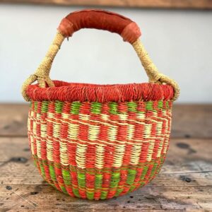 Handcrafted small round Bolga basket woven by Ghanaian artisans