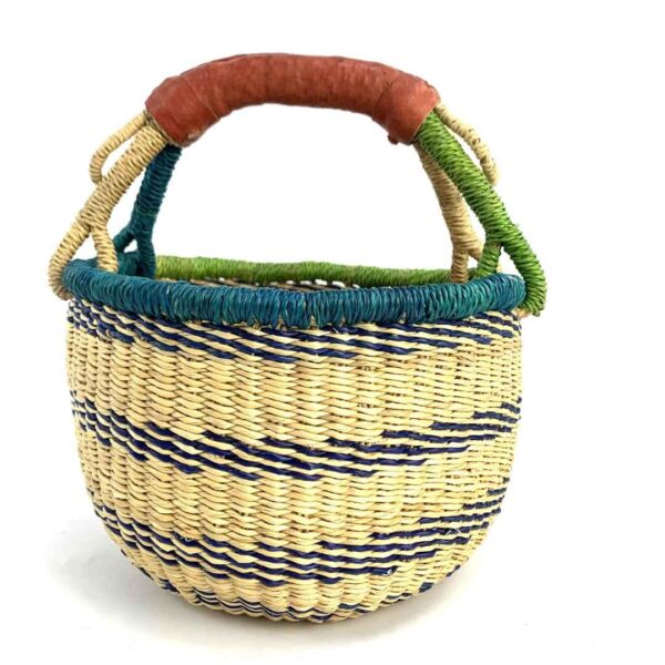 small-round-basket-719-tweed-teal-green-bolga-handwoven-bashiri-3 Front view of the small round Bolga basket with navy stripes on natural straw with a teal and green rim, on a white background