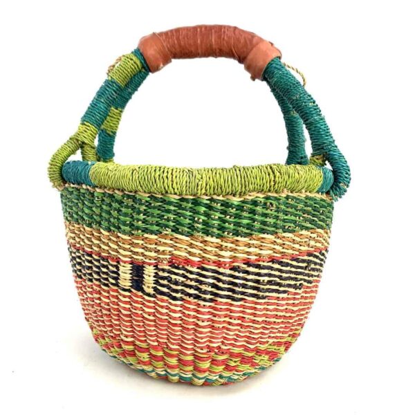 small-round-basket-723-glossy-green-coral-bolga-african-basket-bashiri-3 Front view of the small round Bolga basket with green rim and coral, orange and dark bands, on a white background
