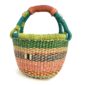 Front view of the small round Bolga basket with green rim and coral, orange and dark bands, on a white background