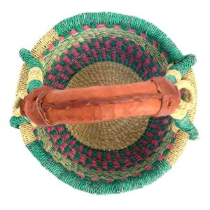 small-round-basket-725-evolution-teal-pink-bolga-handwoven-bashiri-2 Top-down view inside the small round Bolga basket with teal and pink checked bands with a teal rim, showing the coiled base