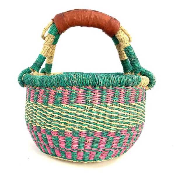 small-round-basket-725-evolution-teal-pink-bolga-handwoven-bashiri-3 Front view of the small round Bolga basket with teal and pink checked bands with a teal rim, on a white background