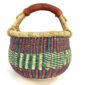 Front view of the small round Bolga basket with teal, red and natural upright stripes, on a white background