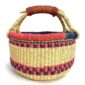 Front view of the small round Bolga basket with red and purple checked bands on natural straw, on a white background