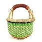 Front view of the small round Bolga basket with a chequered body in fresh, bright tones