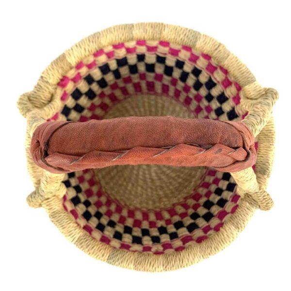 small-round-woven-basket-705-abena-bashiri-3 Top view of the small round Bolga basket showing the coiled base and leather-wrapped handle