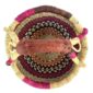 Top view of the small round Bolga basket showing the coiled base and leather-wrapped handle