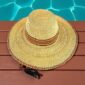 Handwoven African hat featuring natural grass and vibrant colours.