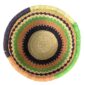 Top view inside the round Bolga storage basket with lime green, coral and navy bands and no handles